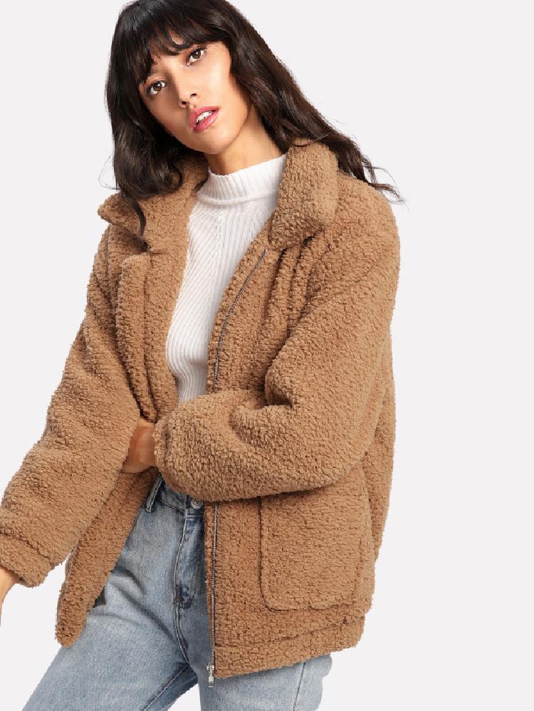 Dual pocket faux fur jacket front closed